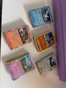 250 Random Pokemon Cards including holos and reverses