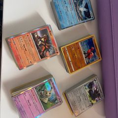 250 Random Pokemon Cards including holos and reverses