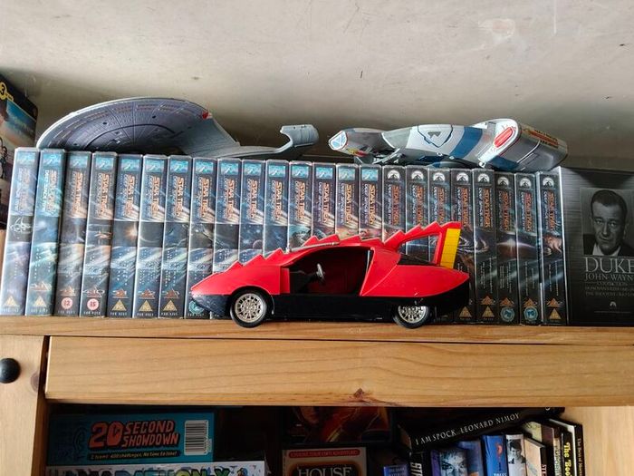 action figure, graphic novel, toys,books, VHS massive collection