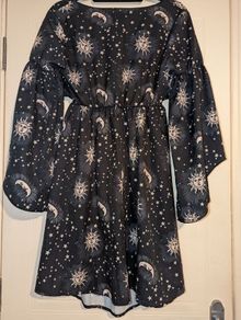 Perfect for Summer. Stunning sun, moon and stars print midi dress
