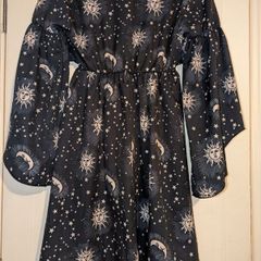 Perfect for Summer. Stunning sun, moon and stars print midi dress