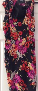 Black dress with flower design from Almost Famous