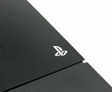 PlayStation 4 Launch Model in Piano Black with Black Steel Controller