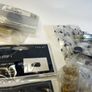 A selection of Door stoppers, Door Lock, Window restrictor and other items. Image 6