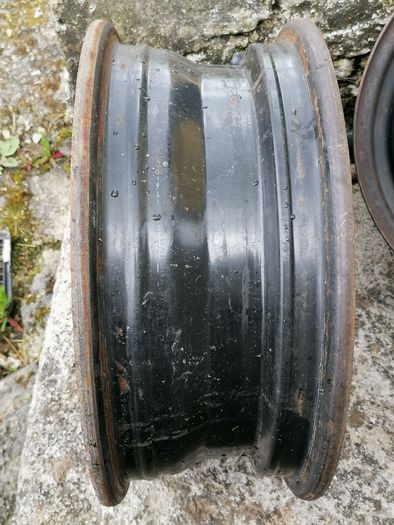 2 x steel rims 15", 4 stud, about 114mm ish from hole centre to the opposite home centre... Possibly fit a nissan etc