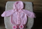 Hand knitted baby  cardigans.