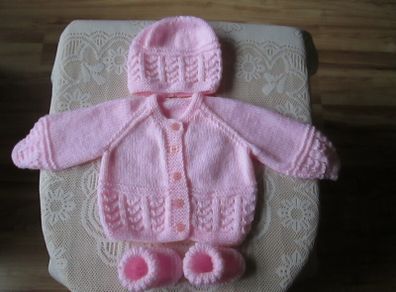 Hand knitted baby  cardigans.