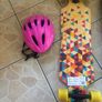 2 skateboards with helmets Image 2