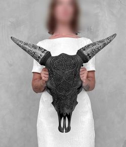 Authentic lage Indonesian carved bull skull