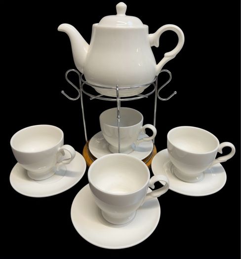 White ceramic coffee set with stand.