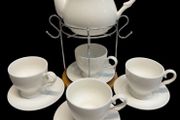 White ceramic coffee set with stand.
