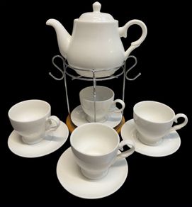 White ceramic coffee set with stand.