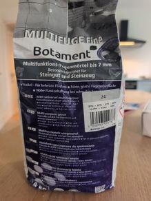 Bag of grey grout - free