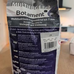 Bag of grey grout - free