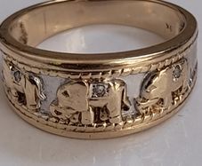 9k gold  elephant ring hallmarked 375 and 3 x0.05 ct diamond