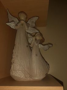 Genises mother and child angel figure
