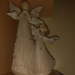 Genises mother and child angel figure