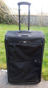 Four Large Suitcases for Moving and Storage
