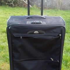 Four Large Suitcases for Moving and Storage