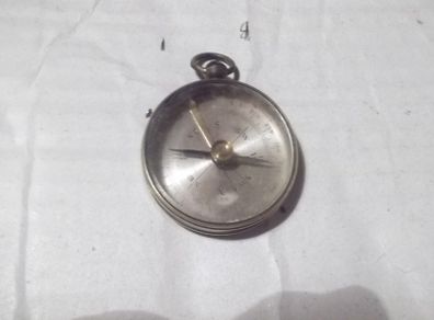 a  antique pocket compass  working