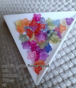 Acrylic flower beads.