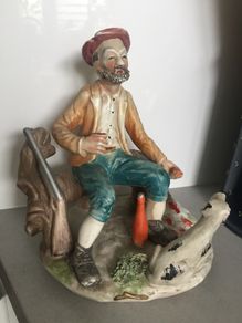 Vintage Ceramic Fisherman Figurine