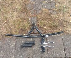 Handlebars, brake levers, hand grips.