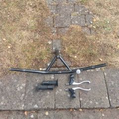 Handlebars, brake levers, hand grips.