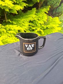 Vat 69 whiskey pitcher postage possible