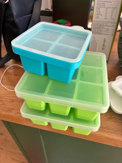 Baby weaning spoons, freezer trays, bibs, cup