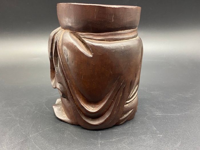 Chinese carved hardwood brush pot, carved with a Chinese Man