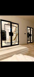 Pair of Crittal black Barcelona doors belgravia ra