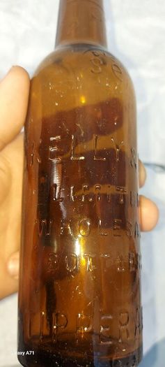 kelly & co tipperary old vintage bottle, collectors item, see pictures for condition good, sold as seen,free shipping within Ireland, thank you