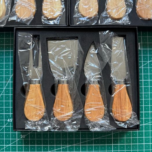 5 sets of boxed cheese knives
