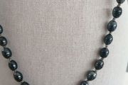 Hand knotted long beaded necklace