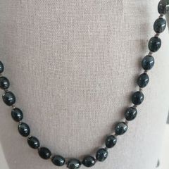Hand knotted long beaded necklace