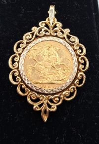 Full sovereign coin mounted in 9ct yellow gold pendant