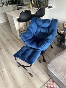 Armchair with footrest