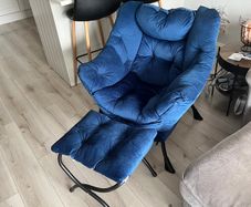 Armchair with footrest