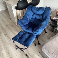 Armchair with footrest