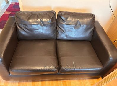 Free faux leather black 2 seater sofa
