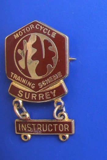 MOTORCYCLE TRAINING SCHEME (Surrey) - enamel badge with an INSTRUCTOR bar (c.1990's). Scarce with any added bar(s).