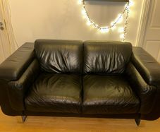Black leather 2-seater sofa
