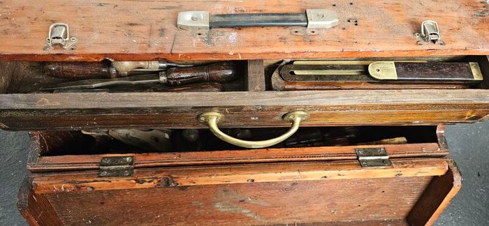 Wooden tool case with tools