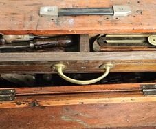 Wooden tool case with tools