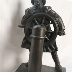 Bronze helmsman figurine