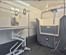 mobile dog grooming van