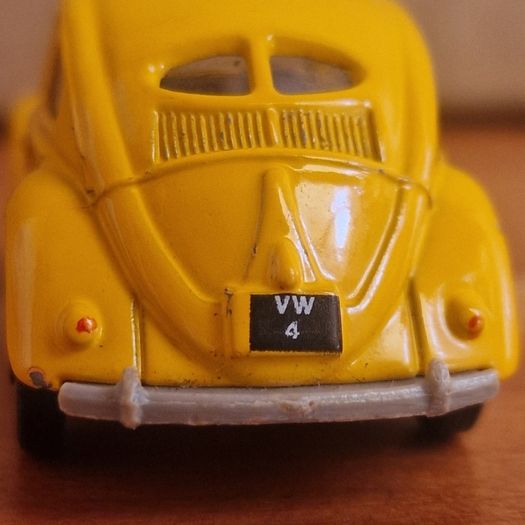 4 vintage toy cars -