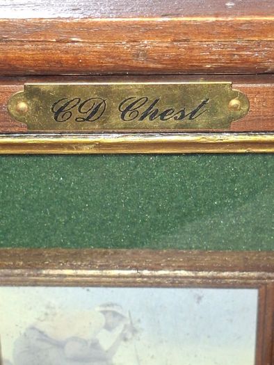 Beautiful Wooden Golf-Themed Shadow Box and Storage Unit with Shelves Cabinet, featuring a glass door front Inside the glass display panel, it showcases a vintage-style collage celebrating the history of golf,