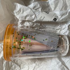 Cup with straw